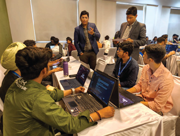 Students receiving hackathon mentorship