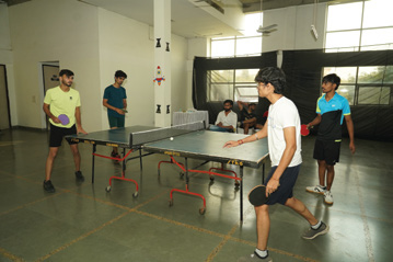Students playing table tennis